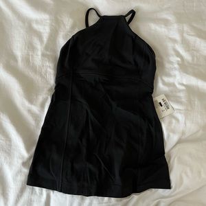 Brand new Lululemon workout top size 4 :)